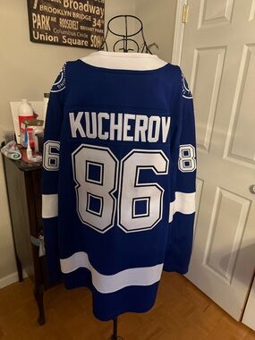 Fanatics Blue and White NHL Jersey Interior Tag Detail